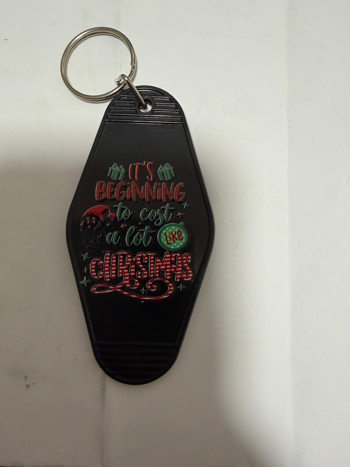 Premade It's Beginning to Cost Keyring